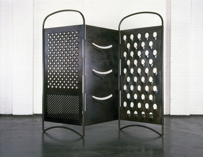 Mona Hatoum Grater Divide 2002 A large screen, like those used in hospitals, made out of metal with sharp holes in it like a giant cheese grater