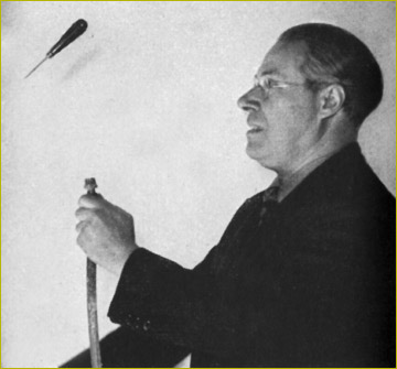 Photo of Moholy-Nagy levitating a chisel