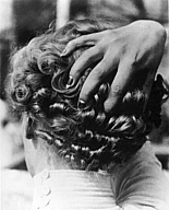 Lee Miller, Woman with hand on head (also known as Coiffure), Paris, 1931