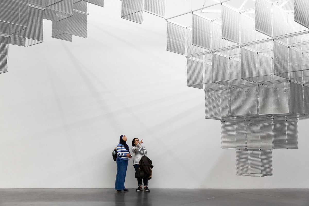 Visitors in the Materials and Objects display at Tate Modern