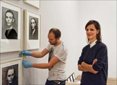Senior Curator Catherine Wood installing the A Bigger Splash: Painting after Performance exhibition with the Tate Art Handling team
