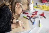Child drawing in the studio