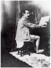 Photograph, said to be of Paul Gauguin playing the harmonium, taken by Alphonse Marie Mucha in his studio (1895)