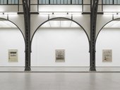 Installation shot in Hamburger Bahnhof building of three prints of scores which has been crossed out