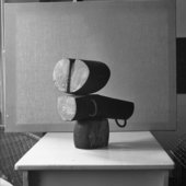 black and white photograph of an abstract wooden sculpture 