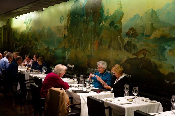 Photograph of diners in the Rex Whistler restaurant at Tate Britain